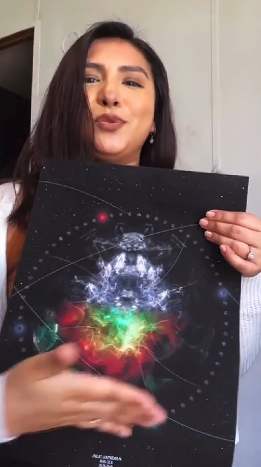 Delighted customer holding their personalized Soul Blueprint Art, showcasing their unique Human Design Chart in vibrant colors.